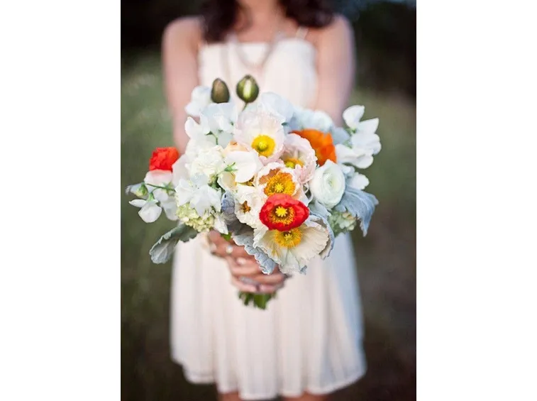 Un bel bouquet con tanti papaveri variopinti
